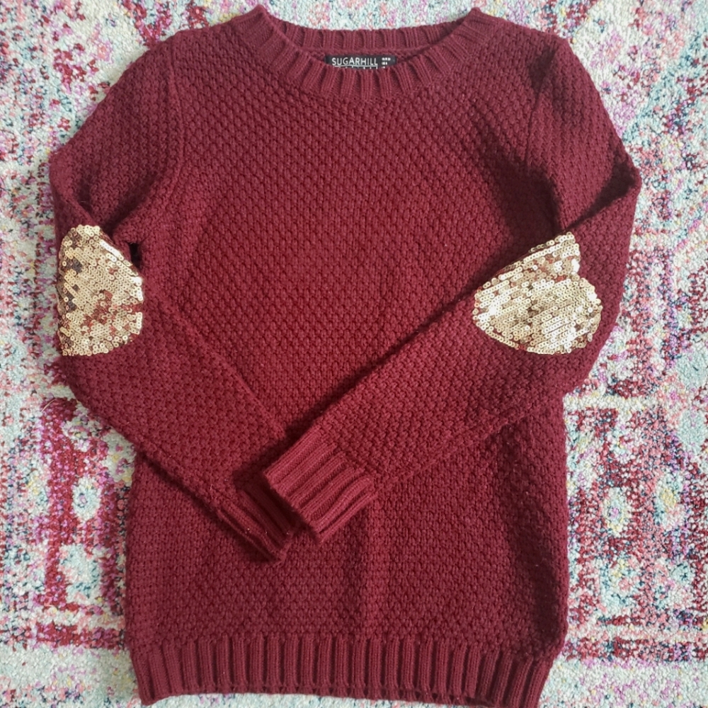 Burgundy sweater with sequin elbow patch